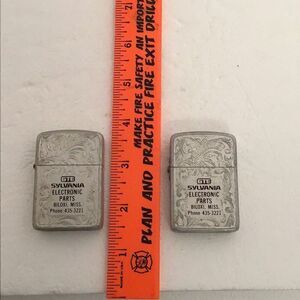 Pair of vintage PARK Venetian embossed advertising lighters